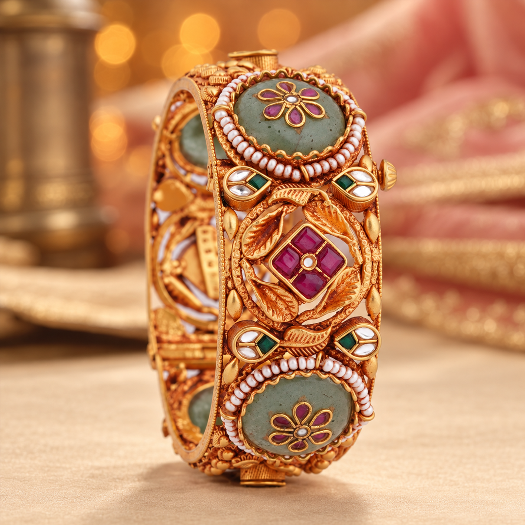 Floral Medallion Heritage Bangle with Ruby & Green Accents